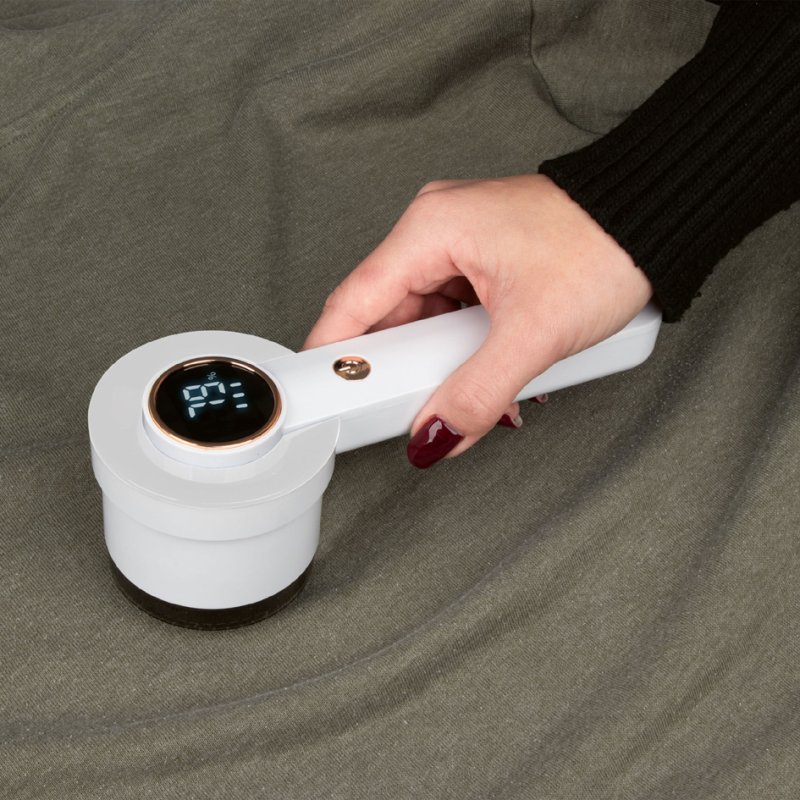 PROFI CARE lint shaver PC-TC 312, white/pink, rechargeable, LED display, stainless steel blades